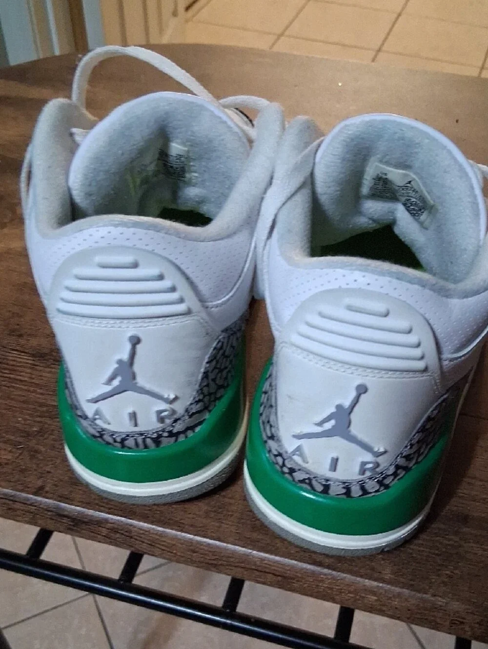 Jordan White Leather Athletic Sneakers with Green and Red Accents